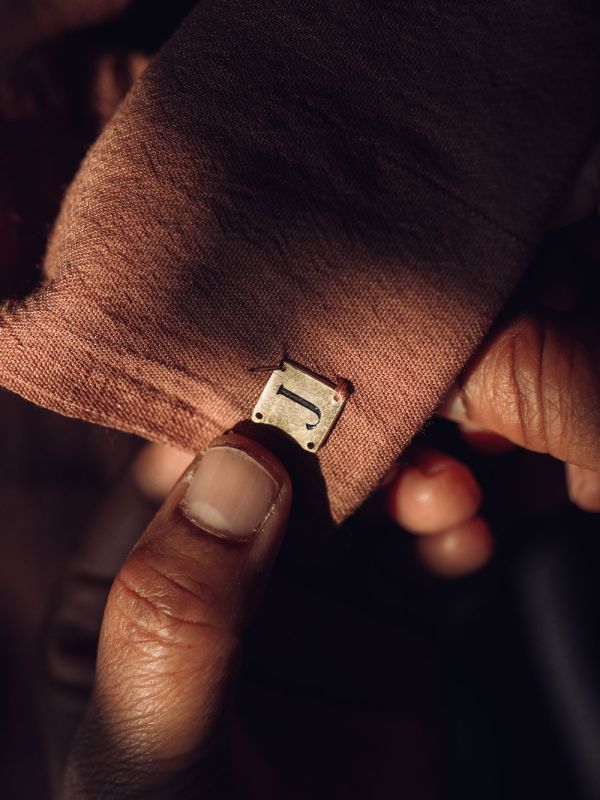 Jijivisha Nepal Sustainable Clothing Brand Tag Stitching